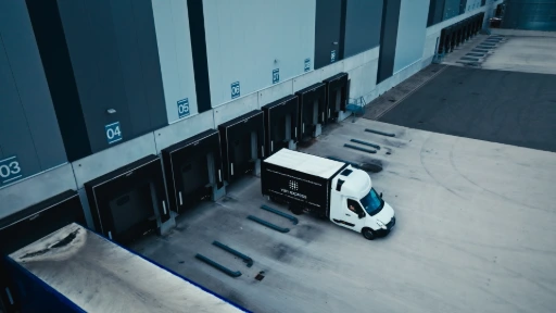 Service vehicle at a commercial loading facility representing developing business ventures